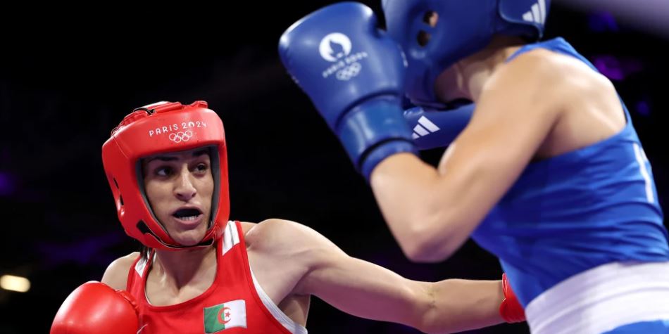 Boxer who was previously banned from women’s events wins match after opponent withdraws in just 46 seconds